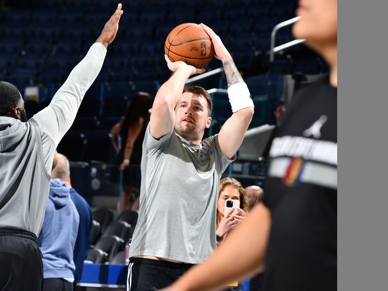 PHOENIX, AZ - NOVEMBER 12: Luka Doncic #77 of the Dallas Mavericks warms up before the game against the Golden State Warriors during the Emirates NBA Cup game on November 12, 2024 at Footprint Center in Phoenix, Arizona. NOTE TO USER: User expressly acknowledges and agrees that, by downloading and or using this photograph, user is consenting to the terms and conditions of the Getty Images License Agreement. Mandatory Copyright Notice: Copyright 2024 NBAE (Photo by Barry Gossage/NBAE via Getty Images)