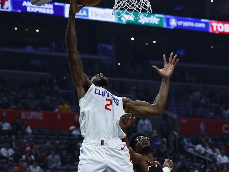 LOS ANGELES, CALIFORNIA - DECEMBER 11:  Kawhi Leonard #2 of the LA Clippers takes a shot against the Portland Trail Blazers in the first half at Crypto.com Arena on December 11, 2023 in Los Angeles, California.  NOTE TO USER: User expressly acknowledges and agrees that, by downloading and/or using this photograph, user is consenting to the terms and conditions of the Getty Images License Agreement. (Photo by Ronald Martinez/Getty Images)