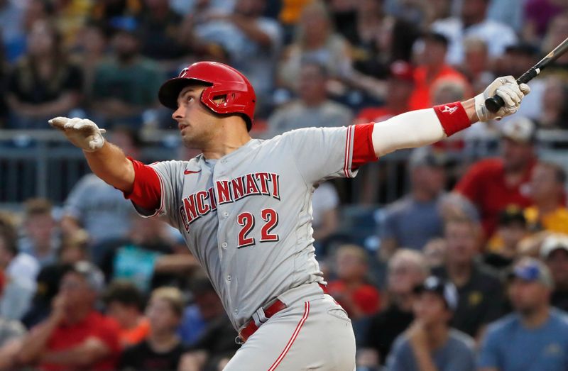 Aug 11, 2023; Pittsburgh, Pennsylvania, USA;  Cincinnati Reds catcher Luke Maile (22) hits a three-run home run against the Pittsburgh Pirates during the fourth inning at PNC Park. Mandatory Credit: Charles LeClaire-USA TODAY Sports