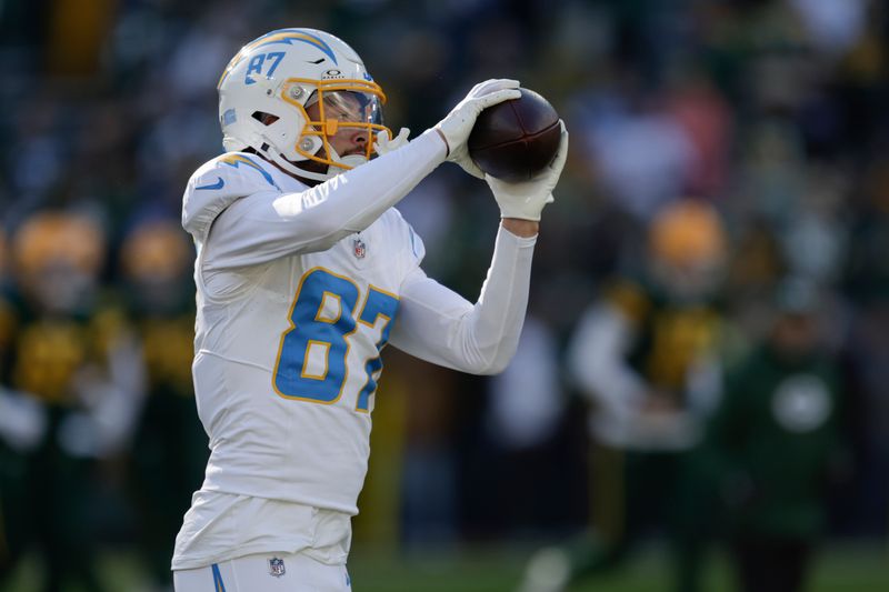 Los Angeles Chargers wide receiver Simi Fehoko works out prior to an NFL football game against the Green Bay Packers, Sunday, Nov. 19, 2023, in Green Bay, Wis. (AP Photo/Matt Ludtke)