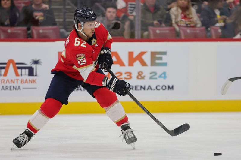 Feb 6, 2024; Sunrise, Florida, USA; Florida Panthers defenseman Brandon Montour (62) passes the puck against the Philadelphia Flyers during the first period at Amerant Bank Arena. Mandatory Credit: Sam Navarro-USA TODAY Sports