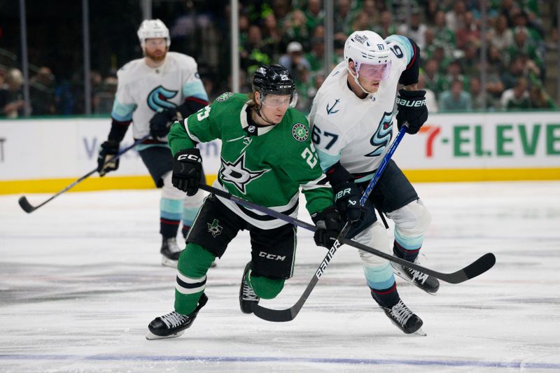 May 15, 2023; Dallas, Texas, USA; Dallas Stars left wing Joel Kiviranta (25) and Seattle Kraken center Morgan Geekie (67) chase the puck during the third period in game seven of the second round of the 2023 Stanley Cup Playoffs at the American Airlines Center. Mandatory Credit: Jerome Miron-USA TODAY Sports