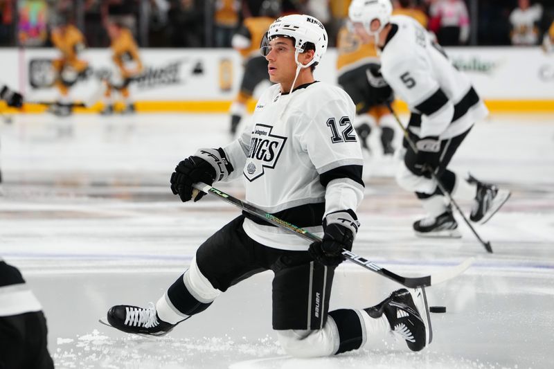 Oct 22, 2024; Las Vegas, Nevada, USA; Los Angeles Kings left wing Trevor Moore (12) warms up before a game against the Vegas Golden Knights at T-Mobile Arena. Mandatory Credit: Stephen R. Sylvanie-Imagn Images