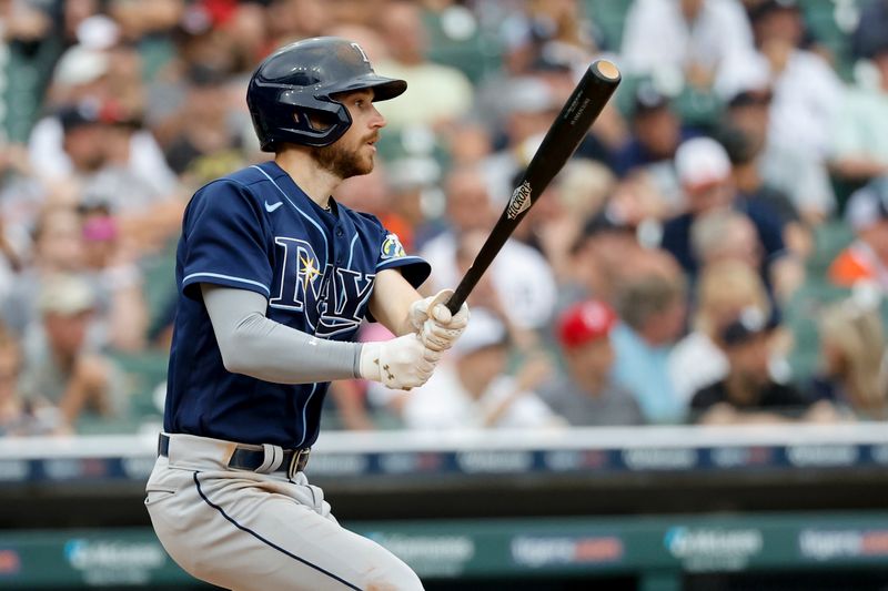 Aug 6, 2023; Detroit, Michigan, USA; Tampa Bay Rays second baseman Brandon Lowe (8) hits a home run in the fourth inning against the Detroit Tigers at Comerica Park. Mandatory Credit: Rick Osentoski-USA TODAY Sports