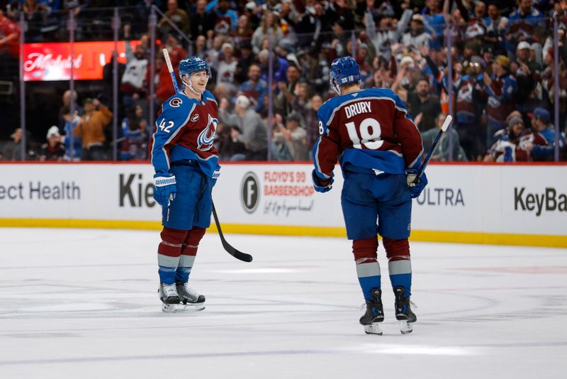 Jan 8, 2026; Denver, Colorado, USA; Colorado Avalanche defenseman Josh Manson (42) celebrates his goal with center Jack Drury (18) in the second period against the Ottawa Senators at Ball Arena. Mandatory Credit: Isaiah J. Downing-Imagn Images