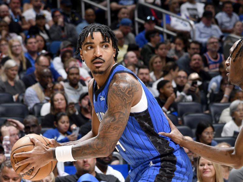 ORLANDO, FL - MARCH 23: Gary Harris #14 of the Orlando Magic handles the ball during the game against the New York Knicks on March 23, 2023 at Amway Center in Orlando, Florida. NOTE TO USER: User expressly acknowledges and agrees that, by downloading and or using this photograph, User is consenting to the terms and conditions of the Getty Images License Agreement. Mandatory Copyright Notice: Copyright 2023 NBAE (Photo by Fernando Medina/NBAE via Getty Images)