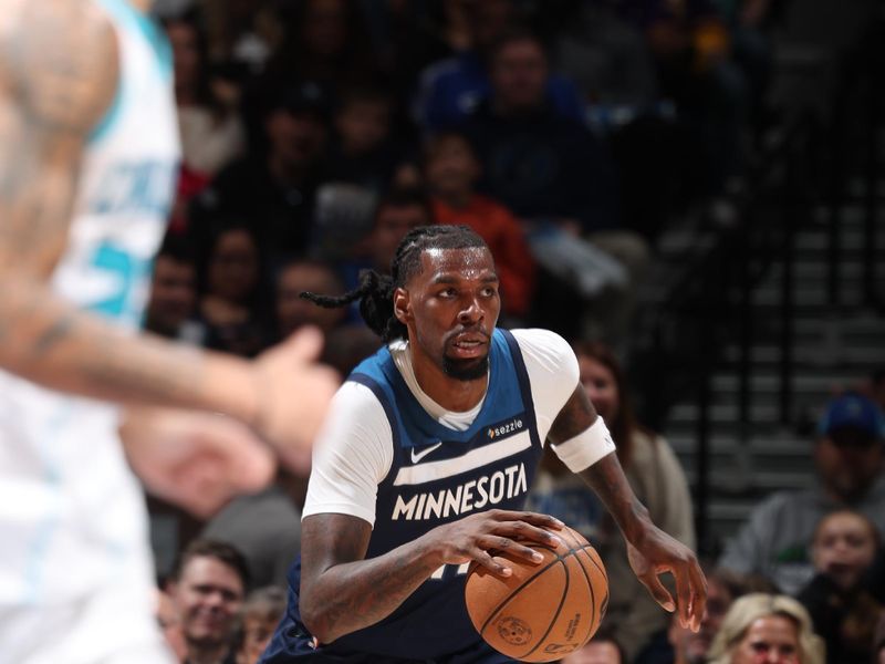 MINNEAPOLIS, MN -  NOVEMBER 4: Naz Reid #11 of the Minnesota Timberwolves dribbles the ball during the game against the Charlotte Hornets on November 4, 2024 at Target Center in Minneapolis, Minnesota. NOTE TO USER: User expressly acknowledges and agrees that, by downloading and or using this Photograph, user is consenting to the terms and conditions of the Getty Images License Agreement. Mandatory Copyright Notice: Copyright 2024 NBAE (Photo by David Sherman/NBAE via Getty Images)