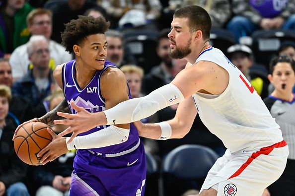 SALT LAKE CITY, UTAH - DECEMBER 08: Ivica Zubac #40 of the LA Clippers defends Keyonte George #3 of the Utah Jazz during the second half of a game at Delta Center on December 08, 2023 in Salt Lake City, Utah. NOTE TO USER: User expressly acknowledges and agrees that, by downloading and or using this photograph, User is consenting to the terms and conditions of the Getty Images License Agreement. (Photo by Alex Goodlett/Getty Images)