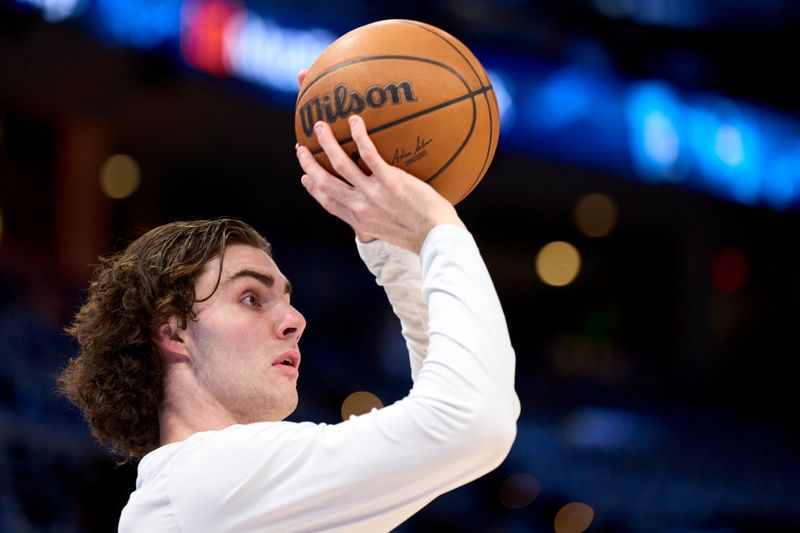 OKLAHOMA CITY, OKLAHOMA - APRIL 21: Josh Giddey #3 of the Oklahoma City Thunder warms up before tipoff against the New Orleans Pelicans in game one of the Western Conference First Round Playoffs at the Paycom Center on April 21, 2024 in Oklahoma City, Oklahoma. NOTE TO USER: User expressly acknowledges and agrees that, by downloading and or using this photograph, User is consenting to the terms and conditions of the Getty Images License Agreement.  (Photo by Cooper Neill/Getty Images)