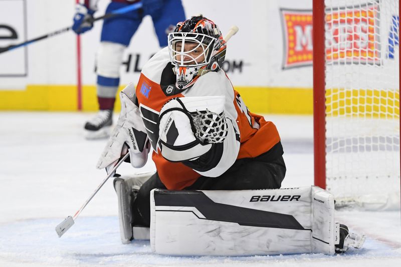 Nov 18, 2024; Philadelphia, Pennsylvania, USA; Philadelphia Flyers goaltender Aleksei Kolosov (35) makes a save against the Colorado Avalanche during the second period at Wells Fargo Center. Mandatory Credit: Eric Hartline-Imagn Images