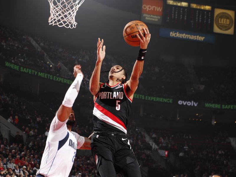 PORTLAND, OR - DECEMBER 1: Dalano Banton #5 of the Portland Trail Blazers drives to the basket during the game against the Dallas Mavericks on December 1, 2024 at the Moda Center Arena in Portland, Oregon. NOTE TO USER: User expressly acknowledges and agrees that, by downloading and or using this photograph, user is consenting to the terms and conditions of the Getty Images License Agreement. Mandatory Copyright Notice: Copyright 2024 NBAE (Photo by Cameron Browne/NBAE via Getty Images)