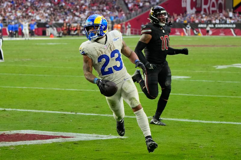 Los Angeles Rams running back Kyren Williams (23) scores a touchdown against the Arizona Cardinals during the first half of an NFL football game, Sunday, Nov. 26, 2023, in Glendale, Ariz. (AP Photo/Rick Scuteri)