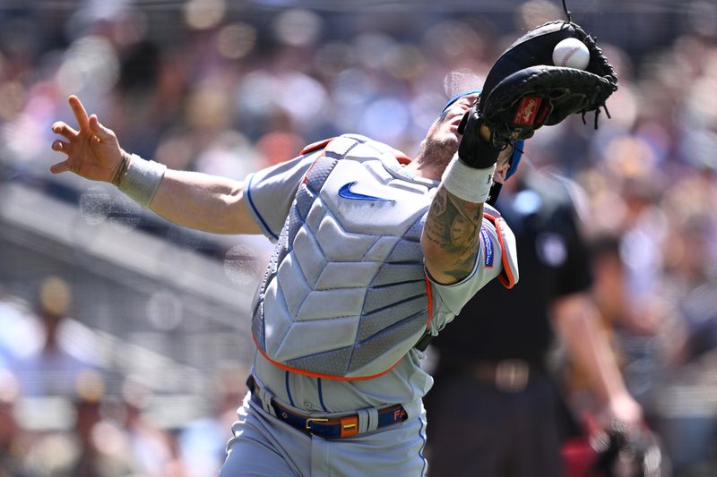 Jul 9, 2023; San Diego, California, USA; New York Mets catcher Francisco Alvarez (4) cannot catch a pop-up hit by San Diego Padres catcher Gary Sanchez (not pictured) during the sixth inning at Petco Park. Mandatory Credit: Orlando Ramirez-USA TODAY Sports