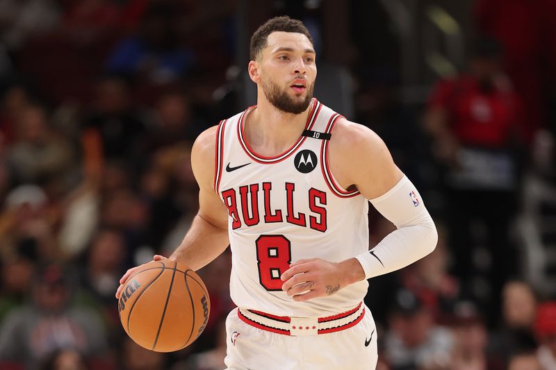 CHICAGO, ILLINOIS - DECEMBER 08: Zach LaVine #8 of the Chicago Bulls dribbles up the court against the Philadelphia 76ers during the second half at the United Center on December 08, 2024 in Chicago, Illinois. NOTE TO USER: User expressly acknowledges and agrees that, by downloading and or using this photograph, User is consenting to the terms and conditions of the Getty Images License Agreement.  (Photo by Michael Reaves/Getty Images)