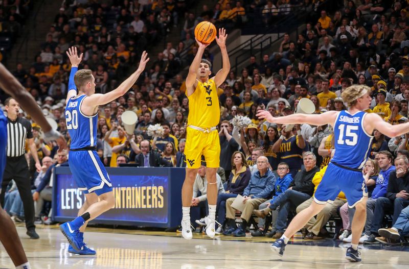 Feb 3, 2024; Morgantown, West Virginia, USA; West Virginia Mountaineers guard Kerr Kriisa (3) shoots a three pointer during the second half against the Brigham Young Cougars at WVU Coliseum. Mandatory Credit: Ben Queen-USA TODAY Sports