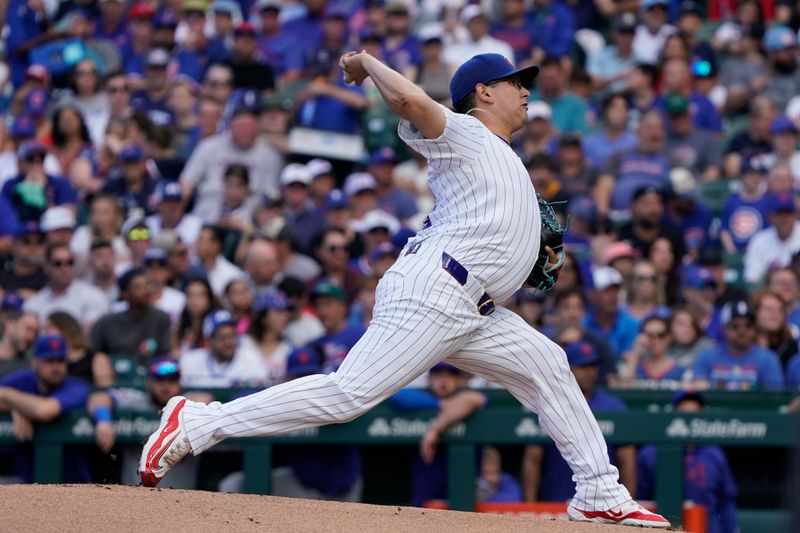 Jun 23, 2024; Chicago, Illinois, USA; Chicago Cubs pitcher Javier Assad (72) throws the ball against the New York Mets during the first inning at Wrigley Field. Mandatory Credit: David Banks-USA TODAY Sports
