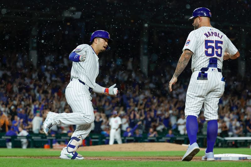 Aug 1, 2024; Chicago, Illinois, USA; Chicago Cubs outfielder Seiya Suzuki (27) rounds the bases after hitting a solo home run against the St. Louis Cardinals during the sixth inning at Wrigley Field. Mandatory Credit: Kamil Krzaczynski-USA TODAY Sports