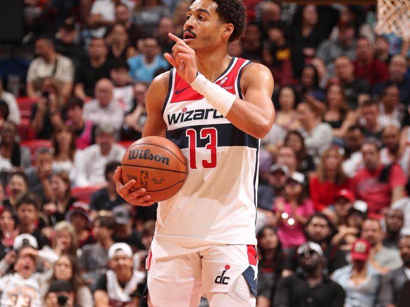 MIAMI, FL - MARCH 10: Jordan Poole #13 of the Washington Wizards looks on during the game against the Miami Heat on March 10, 2024 at Kaseya Center in Miami, Florida. NOTE TO USER: User expressly acknowledges and agrees that, by downloading and or using this Photograph, user is consenting to the terms and conditions of the Getty Images License Agreement. Mandatory Copyright Notice: Copyright 2024 NBAE (Photo by Issac Baldizon/NBAE via Getty Images)