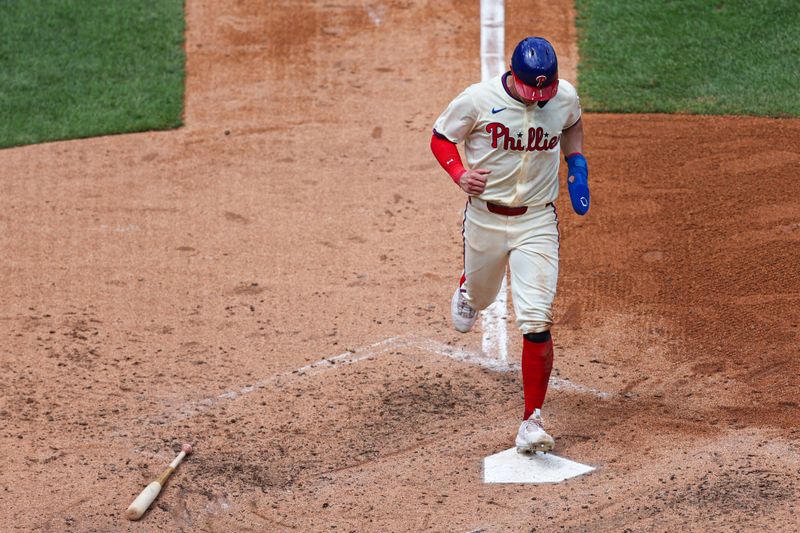 Jul 31, 2024; Philadelphia, Pennsylvania, USA;  Philadelphia Phillies outfielder Austin Hays (9) scores during the fourth inning against the New York Yankees at Citizens Bank Park. Mandatory Credit: Bill Streicher-USA TODAY Sports