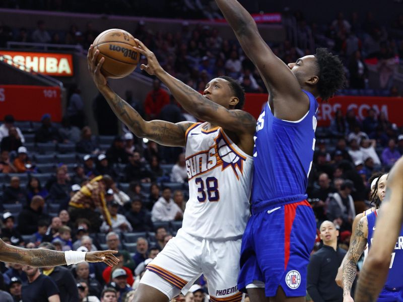 LOS ANGELES, CALIFORNIA - JANUARY 08:  Saben Lee #38 of the Phoenix Suns takes a shot against the LA Clippers in the second half at Crypto.com Arena on January 08, 2024 in Los Angeles, California.  NOTE TO USER: User expressly acknowledges and agrees that, by downloading and/or using this photograph, user is consenting to the terms and conditions of the Getty Images License Agreement.  (Photo by Ronald Martinez/Getty Images)