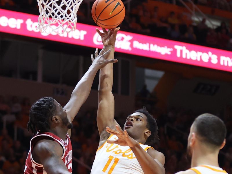 Feb 28, 2023; Knoxville, Tennessee, USA; Tennessee Volunteers forward Tobe Awaka (11) goes to the basket against the Arkansas Razorbacks during the first half at Thompson-Boling Arena. Mandatory Credit: Randy Sartin-USA TODAY Sports