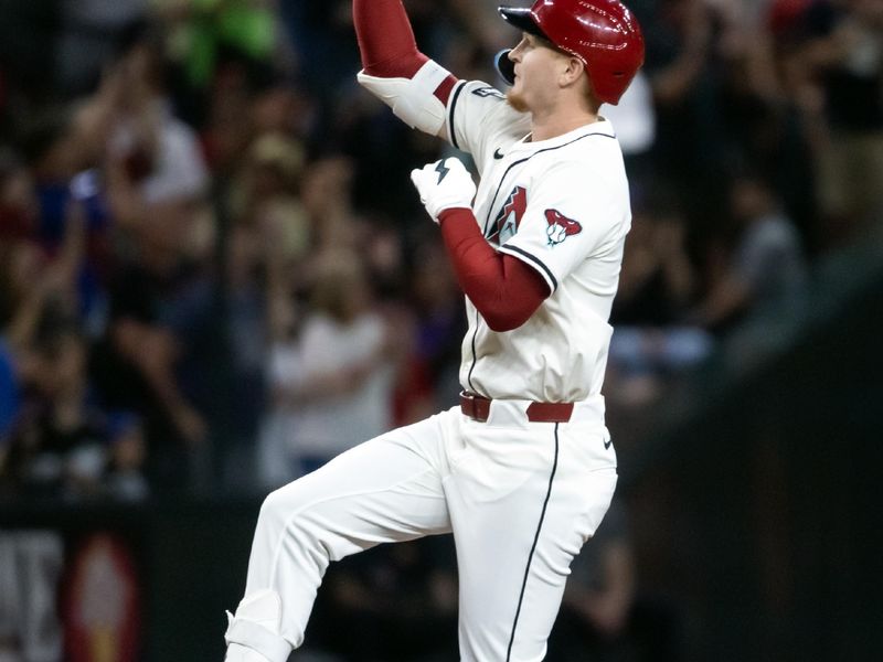 Apr 22, 2025; Phoenix, Arizona, USA; Arizona Diamondbacks outfielder Pavin Smith celebrates after hitting a two run home run in the third inning against the Tampa Bay Rays at Chase Field. Mandatory Credit: Mark J. Rebilas-Imagn Images

