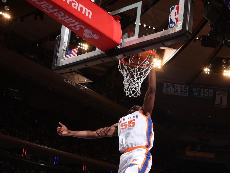 NEW YORK, NY - DECEMBER 1: Ariel Hukporti #55 of the New York Knicks dunks the ball during the game against the New Orleans Pelicans on December 1, 2024 at Madison Square Garden in New York City, New York.  NOTE TO USER: User expressly acknowledges and agrees that, by downloading and or using this photograph, User is consenting to the terms and conditions of the Getty Images License Agreement. Mandatory Copyright Notice: Copyright 2024 NBAE  (Photo by Nathaniel S. Butler/NBAE via Getty Images)