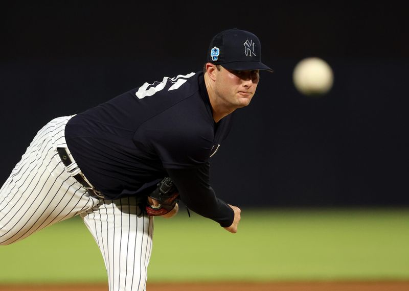 Mar 3, 2023; Tampa, Florida, USA;  New York Yankees starting pitcher Gerrit Cole (45) throws a pitch during the first inning against the Detroit Tigers at George M. Steinbrenner Field. Mandatory Credit: Kim Klement-USA TODAY Sports