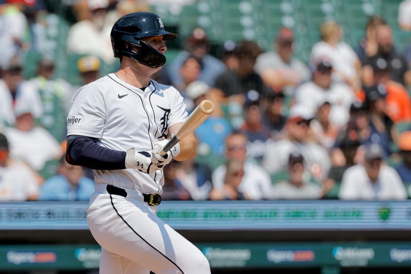 Aug 4, 2024; Detroit, Michigan, USA;  Detroit Tigers second baseman Colt Keith (33) hits a single in the fifth inning against the Kansas City Royals at Comerica Park. Mandatory Credit: Rick Osentoski-USA TODAY Sports