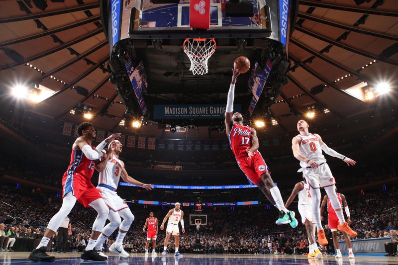 NEW YORK, NY - APRIL 20:  Buddy Heild #17 of the Philadelphia 76ers goes to the basket during the game against the New York Knicks during Round 1 Game 1 of the 2024 NBA Playoffs on April 20, 2024 at Madison Square Garden in New York City, New York.  NOTE TO USER: User expressly acknowledges and agrees that, by downloading and or using this photograph, User is consenting to the terms and conditions of the Getty Images License Agreement. Mandatory Copyright Notice: Copyright 2024 NBAE  (Photo by Nathaniel S. Butler/NBAE via Getty Images)