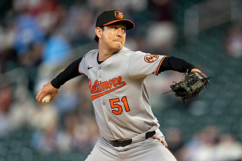 May 7, 2025; Minneapolis, Minnesota, USA; Baltimore Orioles relief pitcher Matt Bowman (51) delivers a pitch against the Minnesota Twins in the eighth inning at Target Field. Mandatory Credit: Jesse Johnson-Imagn Images