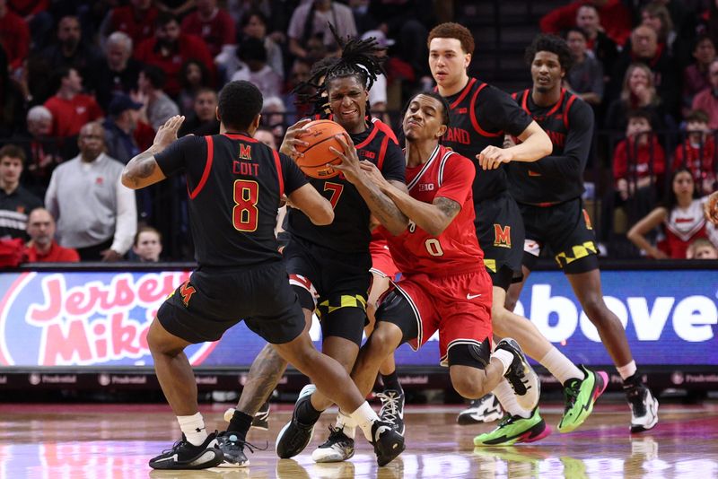 Feb 15, 2026; Piscataway, New Jersey, USA; Maryland Terrapins guard Andre Mills (7) battles of the ball against Rutgers Scarlet Knights guard Tariq Francis (0) during the second half at Jersey Mike's Arena. Mandatory Credit: Vincent Carchietta-Imagn Images