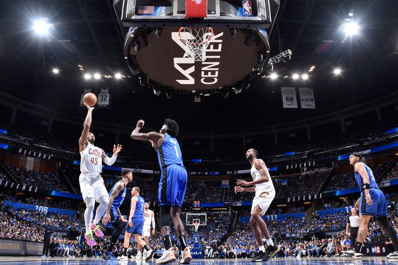 ORLANDO, FL - APRIL 27: Donovan Mitchell #45 of the Cleveland Cavaliers shoots the ball during the game against the Orlando Magic during Round 1 Game 4 of the 2024 NBA Playoffs on April 27, 2024 at the Kia Center in Orlando, Florida. NOTE TO USER: User expressly acknowledges and agrees that, by downloading and or using this photograph, User is consenting to the terms and conditions of the Getty Images License Agreement. Mandatory Copyright Notice: Copyright 2024 NBAE (Photo by Fernando Medina/NBAE via Getty Images)