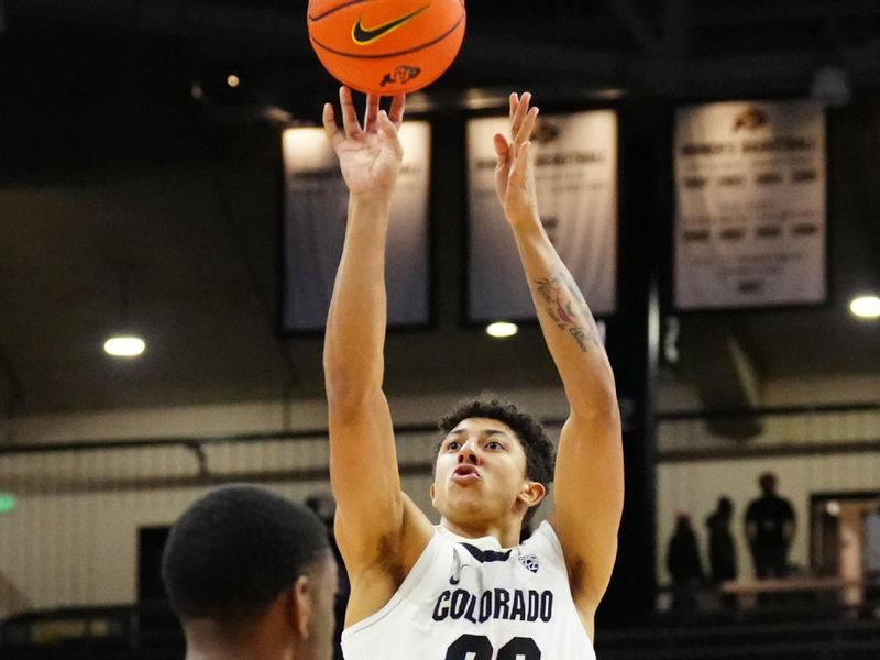 Feb 23, 2023; Boulder, Colorado, USA; Colorado Buffaloes guard Nique Clifford (32) shoots the ball in the first half against the USC Trojans at the CU Events Center. Mandatory Credit: Ron Chenoy-USA TODAY Sports