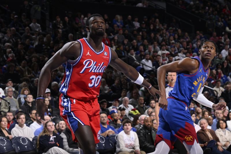 PHILADELPHIA, PA - JANUARY 31: Adem Bona #30 of the Philadelphia 76ers and Peyton Watson #8 of the Denver Nuggets look on during the game on January 31, 2025 at the Wells Fargo Center in Philadelphia, Pennsylvania NOTE TO USER: User expressly acknowledges and agrees that, by downloading and/or using this Photograph, user is consenting to the terms and conditions of the Getty Images License Agreement. Mandatory Copyright Notice: Copyright 2025 NBAE (Photo by David Dow/NBAE via Getty Images)