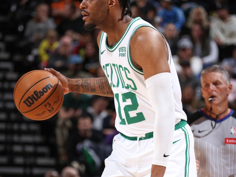 SALT LAKE CITY, UT - MARCH 12:  Oshae Brissett #12 of the Boston Celtics handles the ball during the game  on March 12, 2024 at Delta Center in Salt Lake City, Utah. NOTE TO USER: User expressly acknowledges and agrees that, by downloading and or using this Photograph, User is consenting to the terms and conditions of the Getty Images License Agreement. Mandatory Copyright Notice: Copyright 2024 NBAE (Photo by Melissa Majchrzak/NBAE via Getty Images)