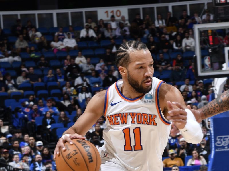 ORLANDO, FL - FEBRUARY 14: Jalen Brunson #11 of the New York Knicks dribbles the ball during the game against the Orlando Magic on February 14, 2024 at the Kia Center in Orlando, Florida. NOTE TO USER: User expressly acknowledges and agrees that, by downloading and or using this photograph, User is consenting to the terms and conditions of the Getty Images License Agreement. Mandatory Copyright Notice: Copyright 2024 NBAE (Photo by Gary Bassing/NBAE via Getty Images)