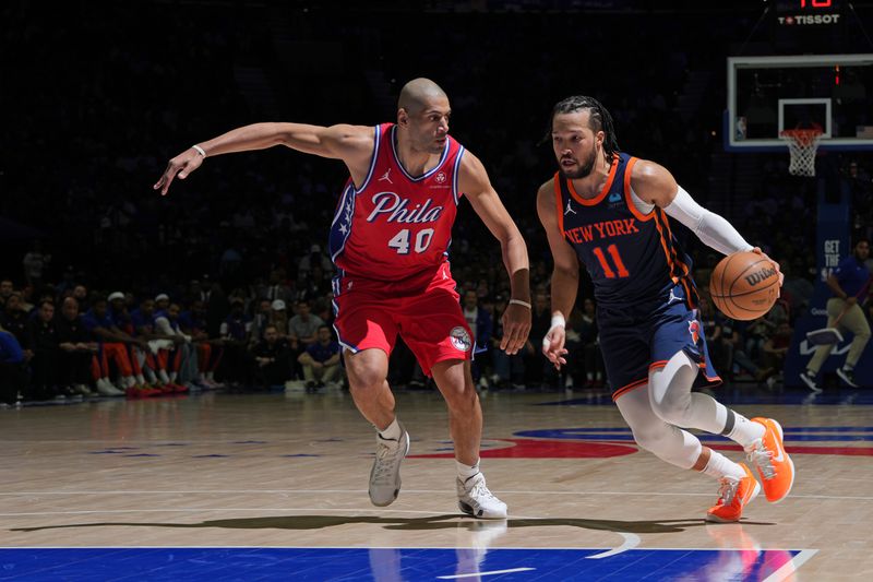 PHILADELPHIA, PA - APRIL 28: Jalen Brunson #11 of the New York Knicks dribbles the ball during the game against the Philadelphia 76ers  during Round 1 Game 4 of the 2024 NBA Playoffs on April 28, 2024 at the Wells Fargo Center in Philadelphia, Pennsylvania NOTE TO USER: User expressly acknowledges and agrees that, by downloading and/or using this Photograph, user is consenting to the terms and conditions of the Getty Images License Agreement. Mandatory Copyright Notice: Copyright 2024 NBAE (Photo by Jesse D. Garrabrant/NBAE via Getty Images)