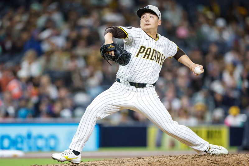 May 17, 2025; San Diego, California, USA; San Diego Padres relief pitcher Yuki Matsui (1) throws a pitch during the ninth inning against the Seattle Mariners at Petco Park. Mandatory Credit: David Frerker-Imagn Images