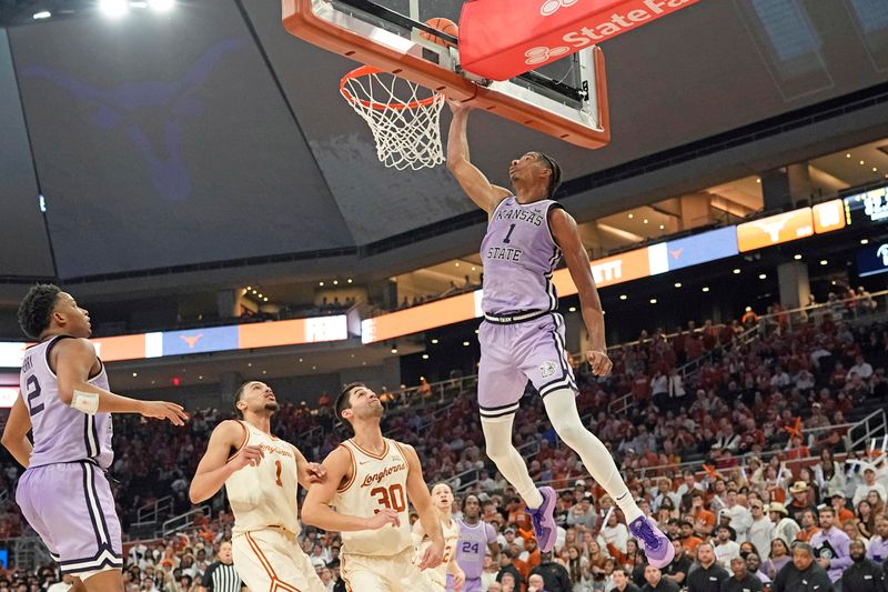 Feb 19, 2024; Austin, Texas, USA; Kansas State Wildcats forward David N'Guessan (1) goes up to dunk during the second half against the Texas Longhorns at Moody Center. Mandatory Credit: Scott Wachter-USA TODAY Sports