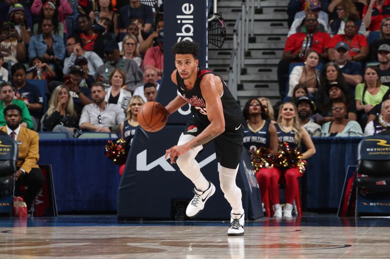 NEW ORLEANS, LA - MARCH 16: Toumani Camara #33 of the Portland Trail Blazers dribbles the ball during the game against the New Orleans Pelicans on March 16, 2024 at the Smoothie King Center in New Orleans, Louisiana. NOTE TO USER: User expressly acknowledges and agrees that, by downloading and or using this Photograph, user is consenting to the terms and conditions of the Getty Images License Agreement. Mandatory Copyright Notice: Copyright 2024 NBAE (Photo by Layne Murdoch Jr./NBAE via Getty Images)