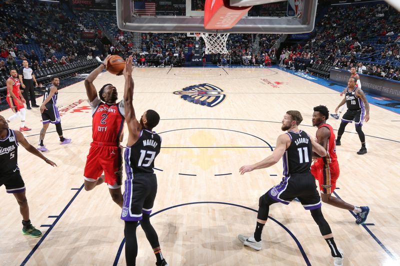 NEW ORLEANS, LA - DECEMBER 12: Herbert Jones #2 of the New Orleans Pelicans shoots the ball during the game against the Sacramento Kings on December 12, 2024 at the Smoothie King Center in New Orleans, Louisiana. NOTE TO USER: User expressly acknowledges and agrees that, by downloading and or using this Photograph, user is consenting to the terms and conditions of the Getty Images License Agreement. Mandatory Copyright Notice: Copyright 2024 NBAE (Photo by Layne Murdoch Jr./NBAE via Getty Images)