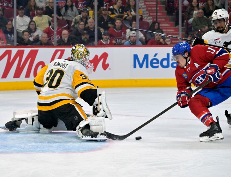 Sep 22, 2025; Montreal, Quebec, CAN; Pittsburgh Penguins goalie Joel Blomqvist (30) stops Montreal Canadiens forward Brendan Gallagher (11) during the second period at the Bell Centre. Mandatory Credit: Eric Bolte-Imagn Images