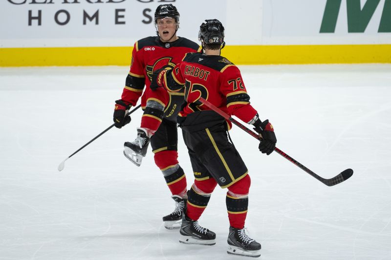 Oct 27, 2025; Ottawa, Ontario, CAN; Ottawa Senators left wing Fabian Zetterlund (20) celebrates with defenseman Thomas Chabot (72) after scoring a goal in the third period against the Boston Bruins at the Canadian Tire Centre. Mandatory Credit: Marc DesRosiers-IMAGN Images