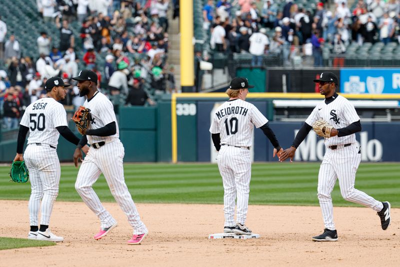 May 24, 2025; Chicago, Illinois, USA; Chicago White Sox players celebrate after defeating the Texas Rangers in a baseball game at Rate Field. Mandatory Credit: Kamil Krzaczynski-Imagn Images