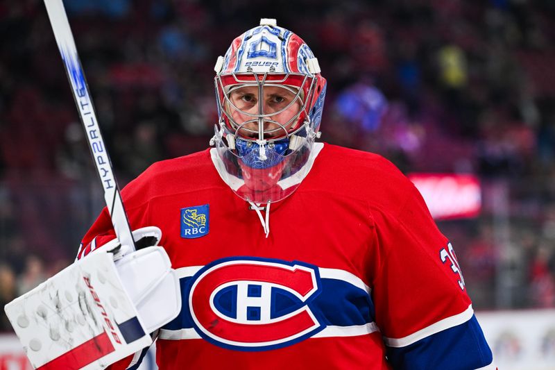 Nov 16, 2024; Montreal, Quebec, CAN; Montreal Canadiens goalie Cayden Primeau (30) looks on during warm-up before the game against the Columbus Blue Jackets at Bell Centre. Mandatory Credit: David Kirouac-Imagn Images