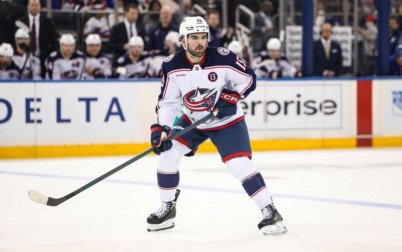 Jan 18, 2025; New York, New York, USA; Columbus Blue Jackets defenseman Dante Fabbro (15) looks for the puck during the second period against the New York Rangers at Madison Square Garden. Mandatory Credit: Danny Wild-Imagn Images