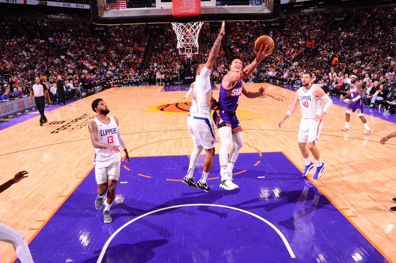 PHOENIX, AZ - APRIL  9:  Grayson Allen #8 of the Phoenix Suns drives to the basket during the game against the LA Clippers on April 9, 2024 at Footprint Center in Phoenix, Arizona. NOTE TO USER: User expressly acknowledges and agrees that, by downloading and or using this photograph, user is consenting to the terms and conditions of the Getty Images License Agreement. Mandatory Copyright Notice: Copyright 2024 NBAE (Photo by Kate Frese/NBAE via Getty Images)