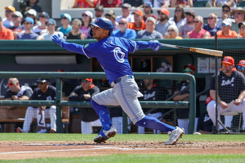 Mar 3, 2025; Lakeland, Florida, USA; Toronto Blue Jays second baseman Andres Gimenez (0) watches a fly ball during the second inning against the Detroit Tigers at Publix Field at Joker Marchant Stadium. Mandatory Credit: Mike Watters-Imagn Images