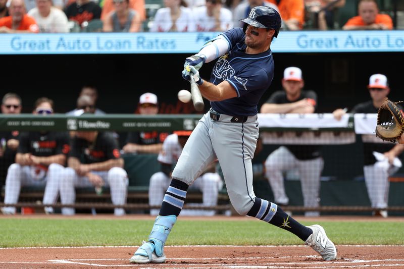 Jun 29, 2025; Baltimore, Maryland, USA; Tampa Bay Rays outfielder Josh Lowe (15) hits a single during the first inning against the Baltimore Orioles at Oriole Park at Camden Yards. Mandatory Credit: Daniel Kucin Jr.-Imagn Images